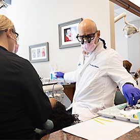 Smiling man with All-on-4 denture