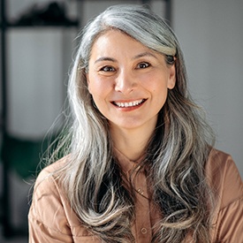 A closeup of a smiling older woman 