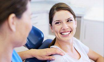 Smiling woman in dental chair