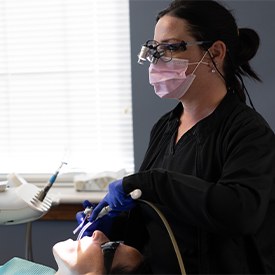 Woman receiving dental exam