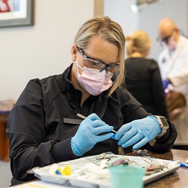 Dentist treating patient