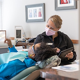 Woman having Invisalign in La Plata fitted