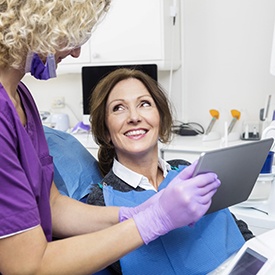 a patient chatting with their dentist