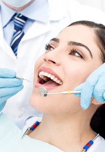 patient getting dental checkup in Dahlgren