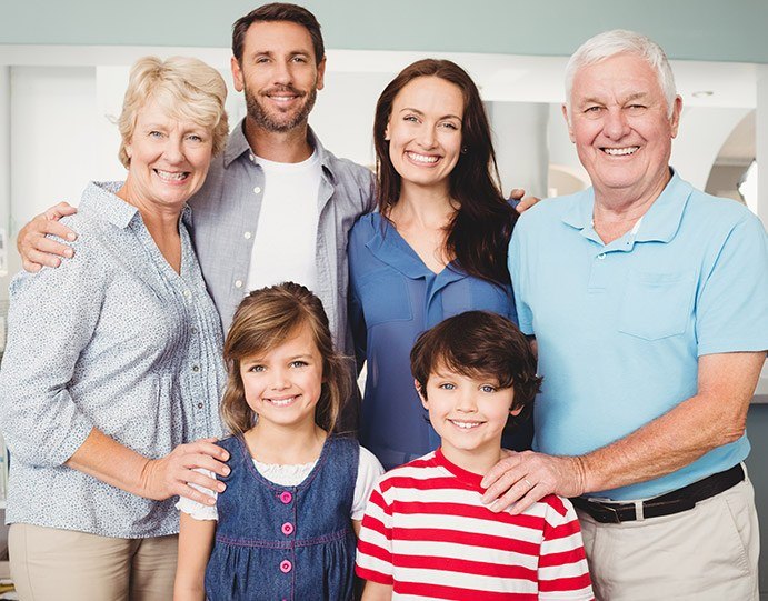 Large family smiling together