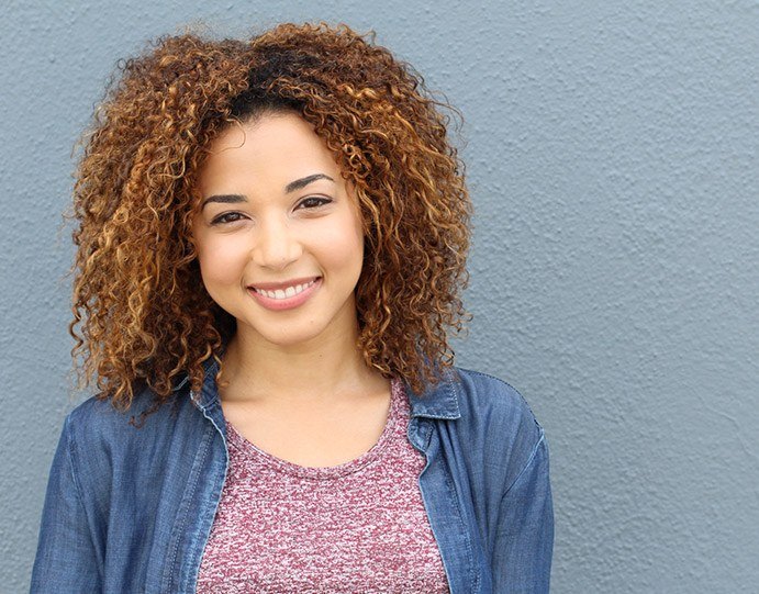 Young woman with perfectly straight teeth