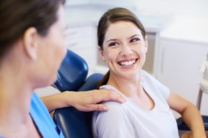 woman happy at dentist