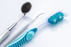 Oral hygiene products at dentist on a table.