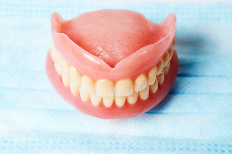 dentures on medical mask in La Plata