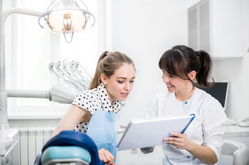 Dentist explaining treatment to a patient